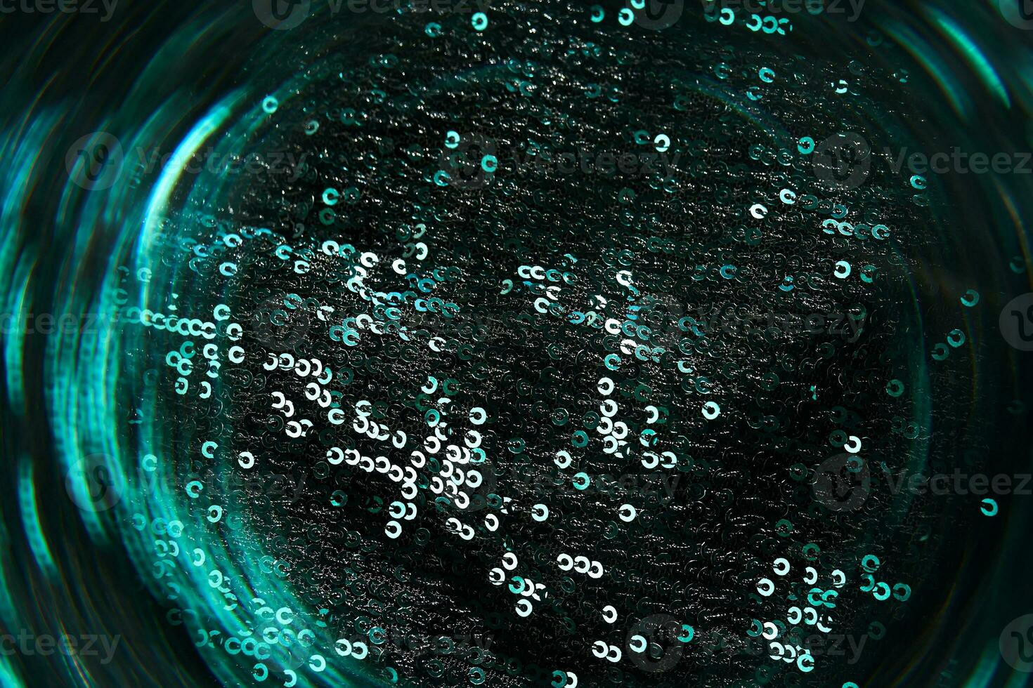 Christmas abstract background made of emerald green sequins. photo