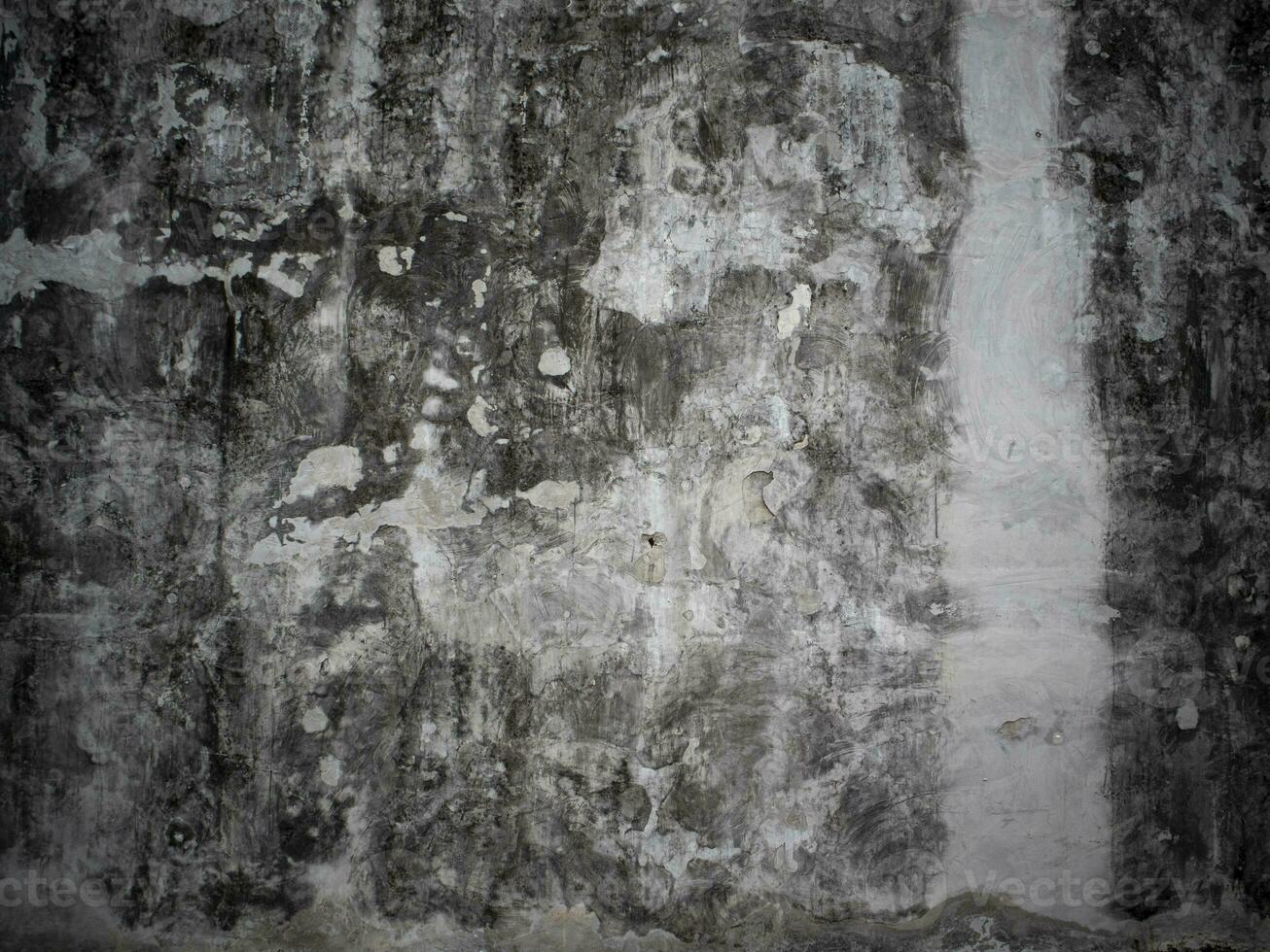Above view of cement plaster surface has an old black stain. For background and textured. photo