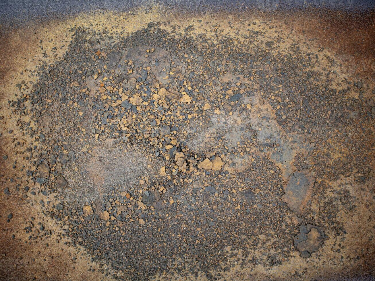 Above view of rusted steel floor. The steel floor was peeling off in sheets in the middle. For background and textured. photo
