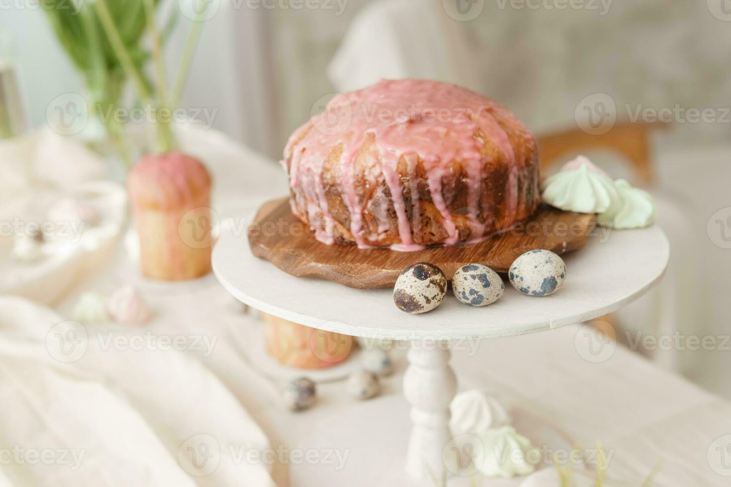 A set table for the celebration of Easter. Cakes and quail eggs on the Easter table. photo