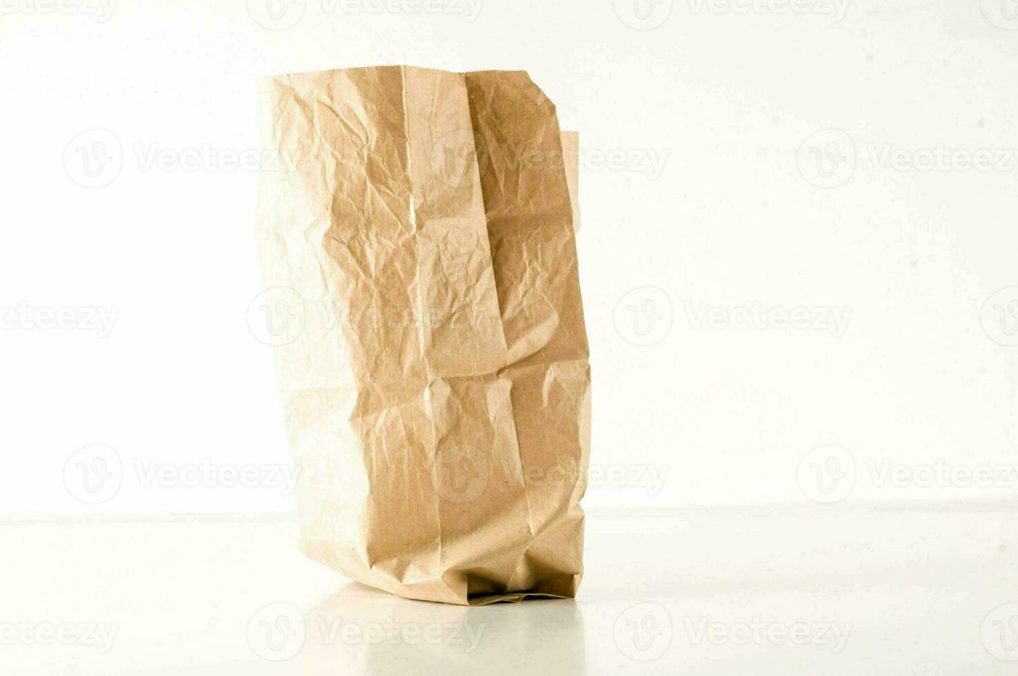 a brown paper bag sitting on a table photo