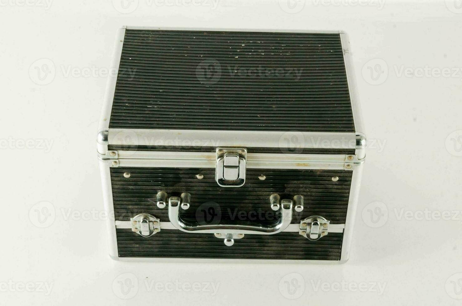 a black and silver suitcase with a handle photo