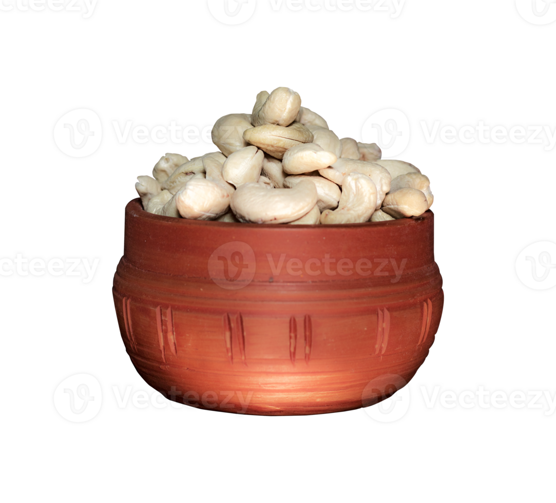 Cashew nuts in a clay bowl isolated on a transparent background, A Clipping path is included for easy selection png