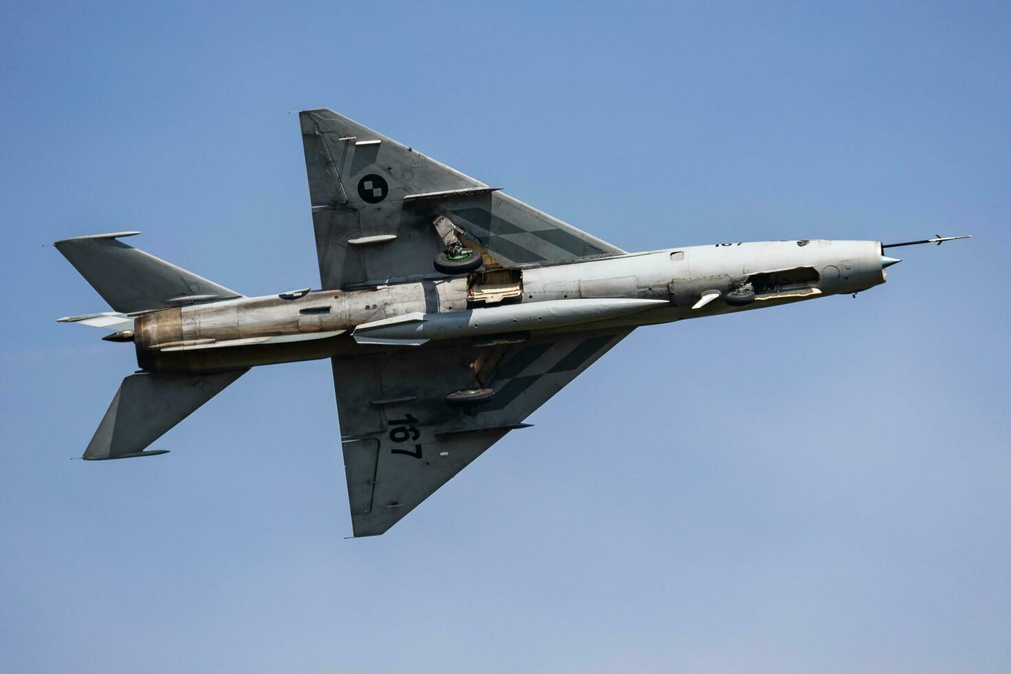 Croatian Air Force MiG-21 Fishbed. Military fighter jet plane at air base. Aviation and aircraft. Air defense. Fly and flying. photo