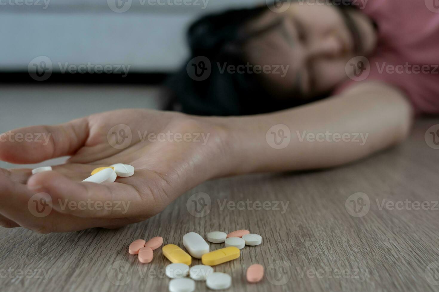 asian woman use pills overdose, stressed, sad, drug abuser, drug addict, sick, unhealthy, unhappy, suicide, depressed or hopeless, Anti drug, drug addict, life and family problems, unmotivated photo