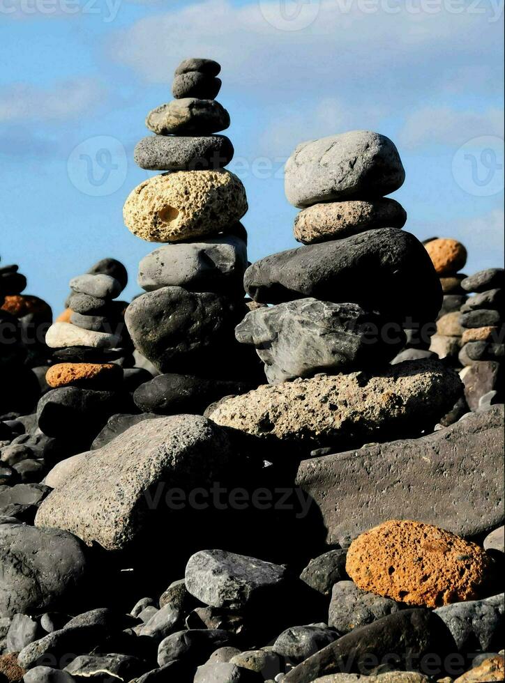 a pile of rocks stacked on top of each other photo