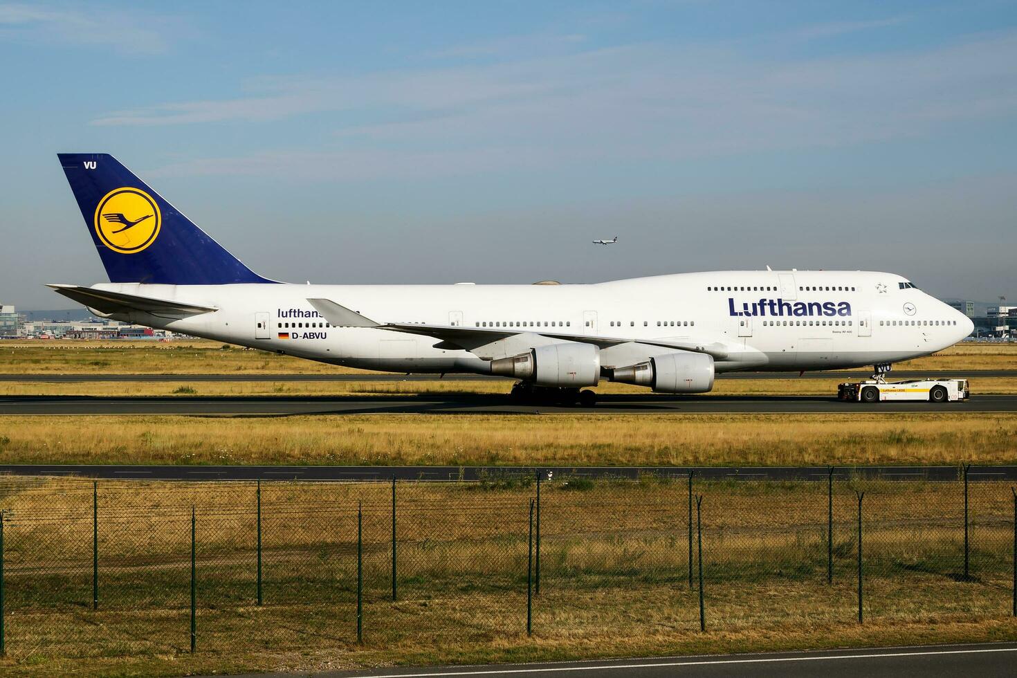 Lufthansa passenger plane at airport. Schedule flight travel. Aviation and aircraft. Air transport. Global international transportation. Fly and flying. photo