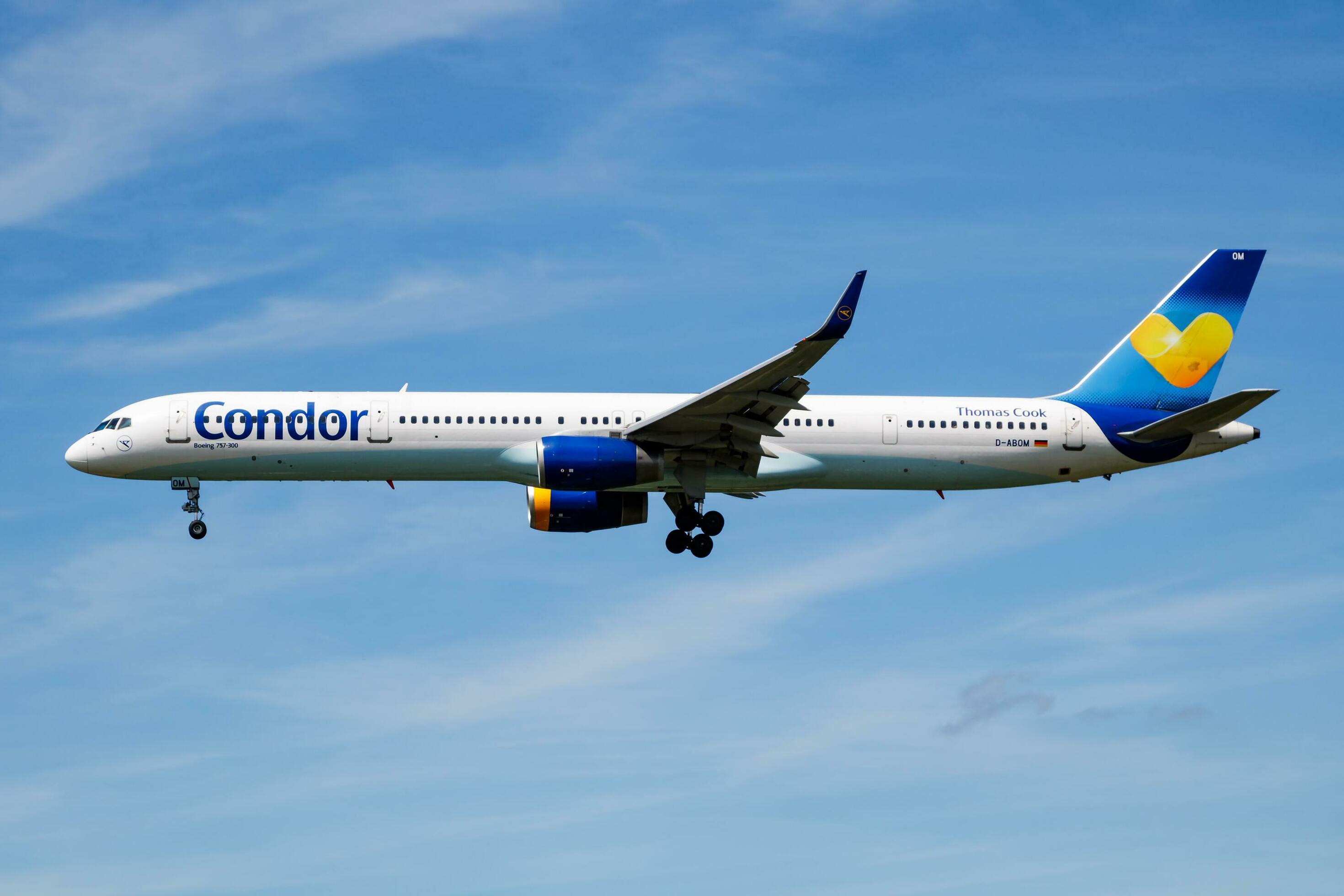 Condor passenger plane at airport. Schedule flight travel. Aviation and