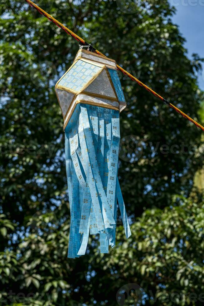 Traditional Diwali decorative paper lantern on street photo