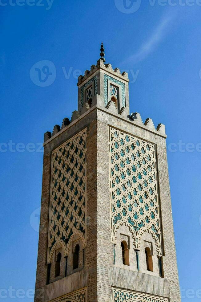 el alminar de el mezquita de persona en marrakech, Marruecos foto