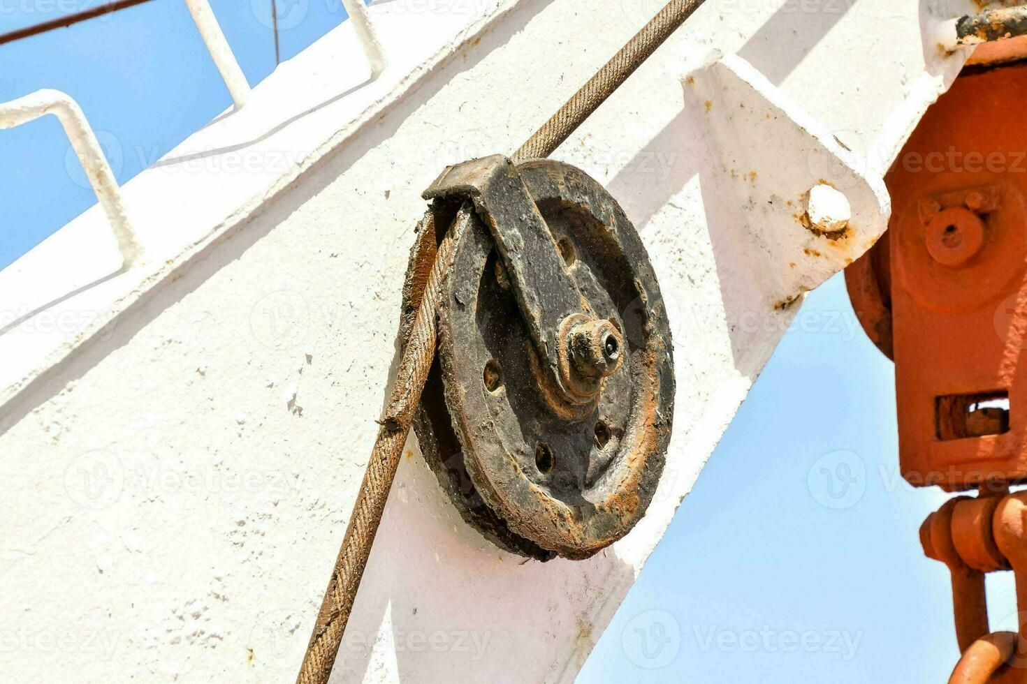 a close up of a crane with a wheel attached photo
