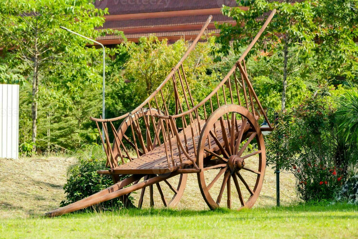 a rusty wagon in the garden photo