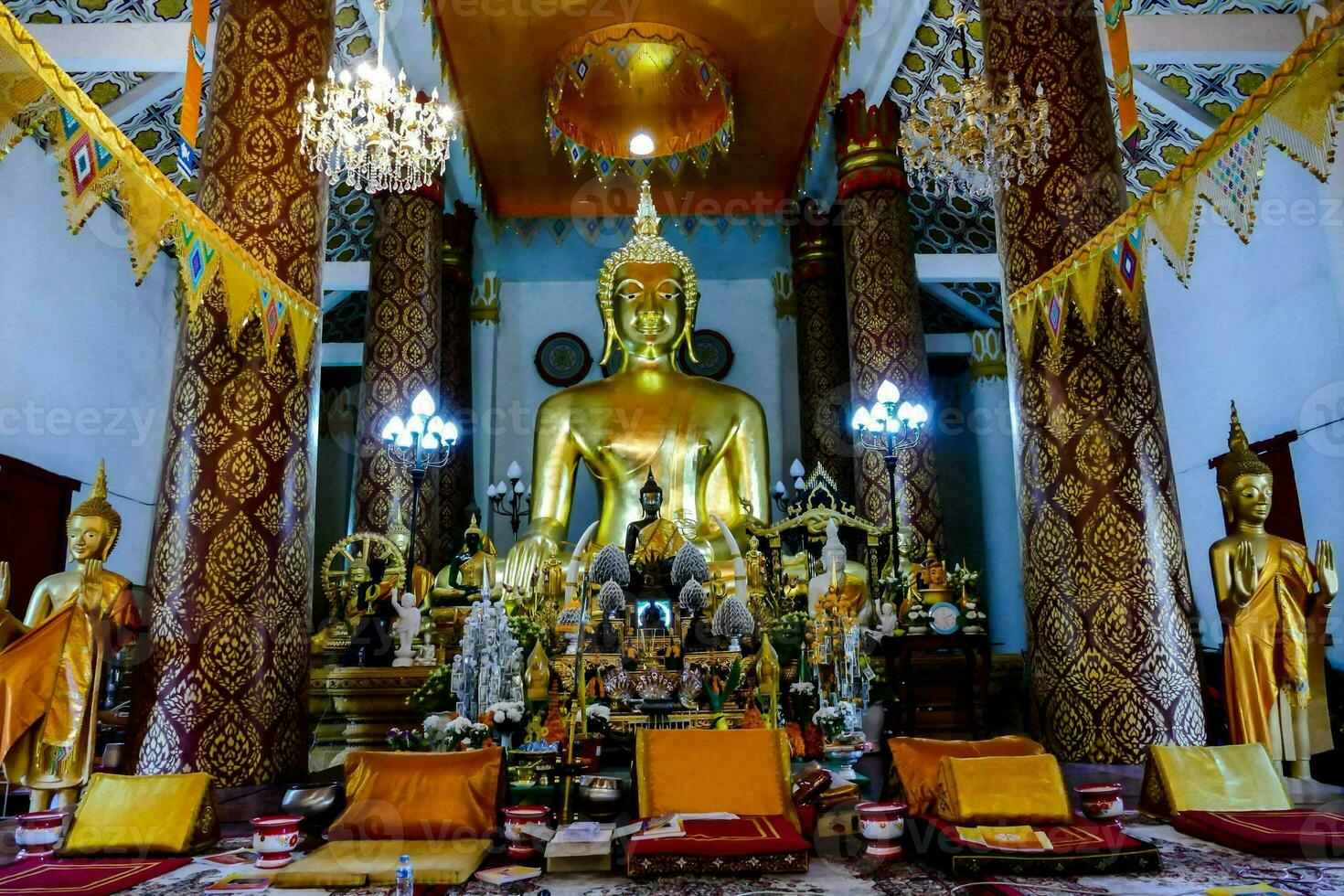 a large buddha statue in a temple photo