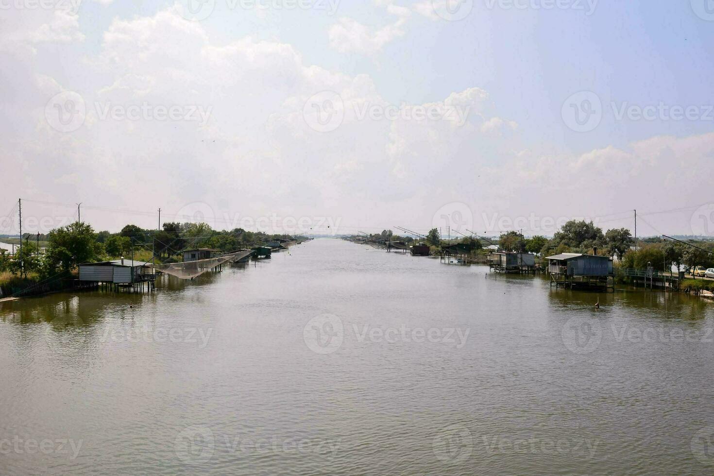 a river with houses on both sides photo