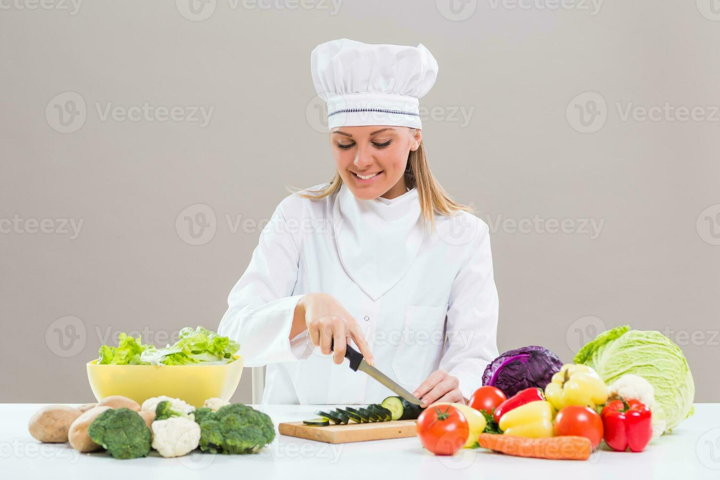 Female chef making healthy meal photo