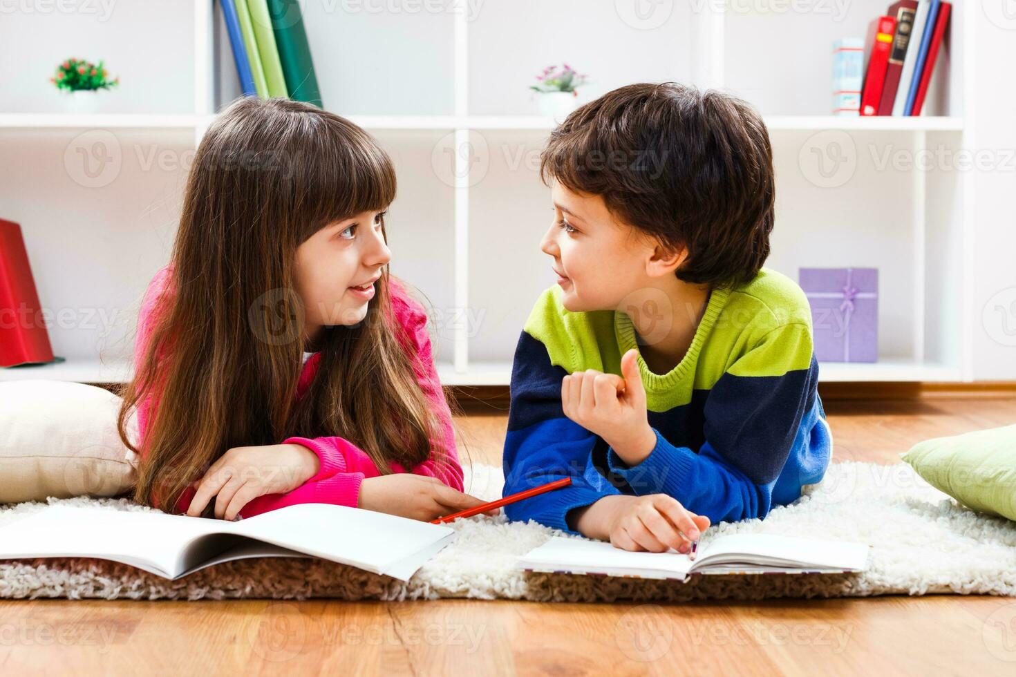 Children doing homework and talking photo