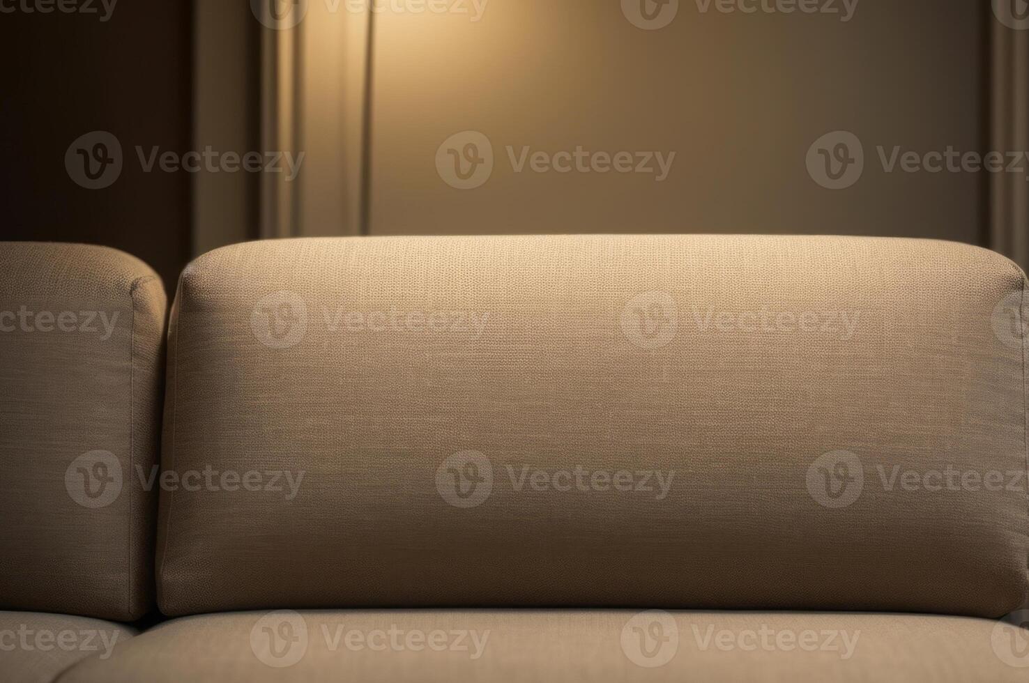 A couch with a light shining on it photo