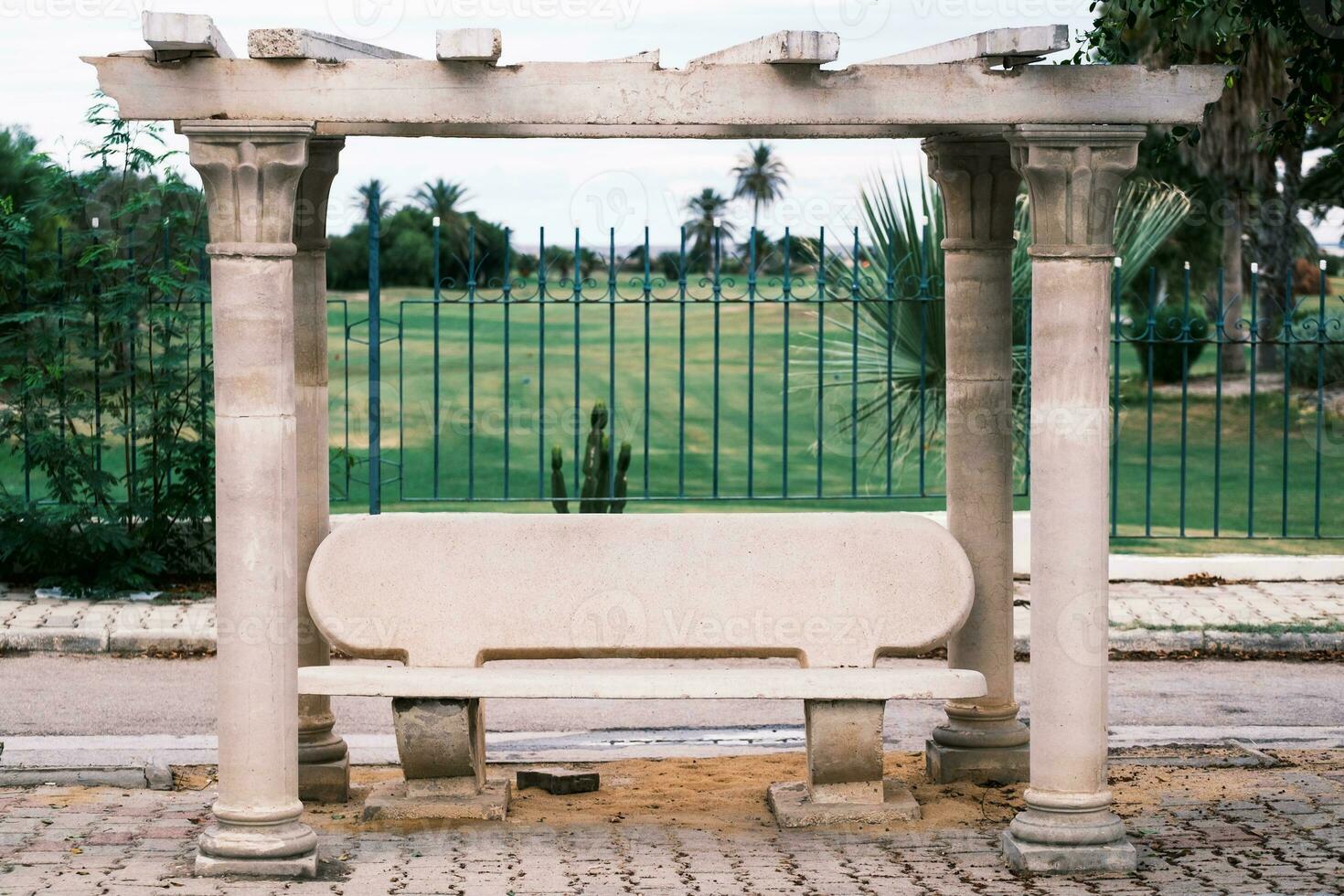 Detail from street in town of Sousse, Tunisia. Bus stop bench. photo