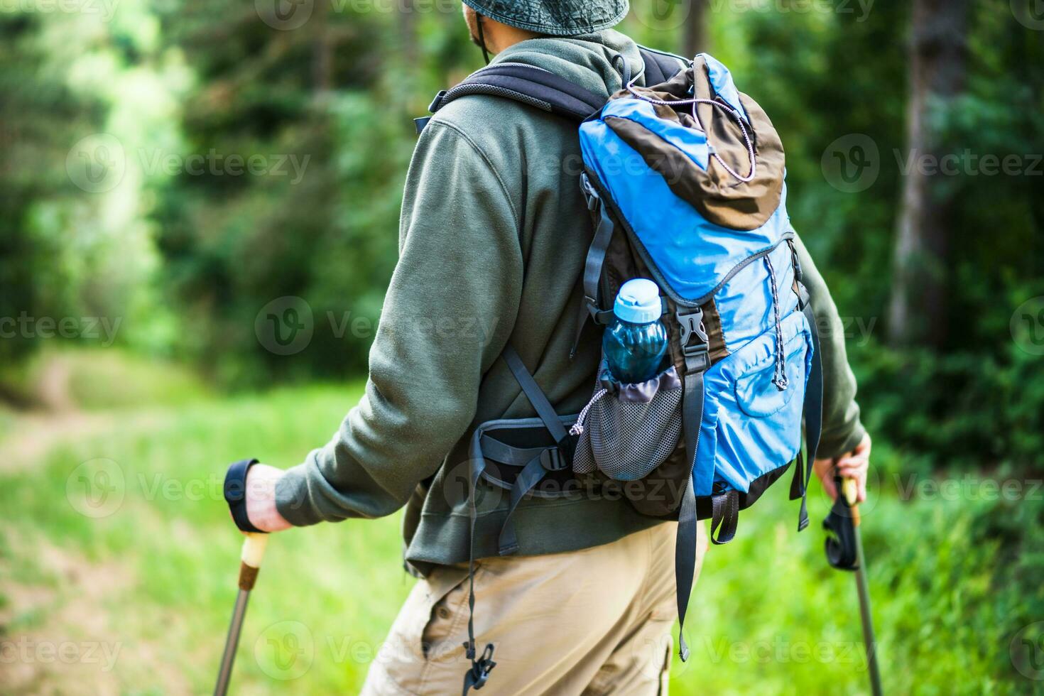 Image of man enjoys hiking in nature photo