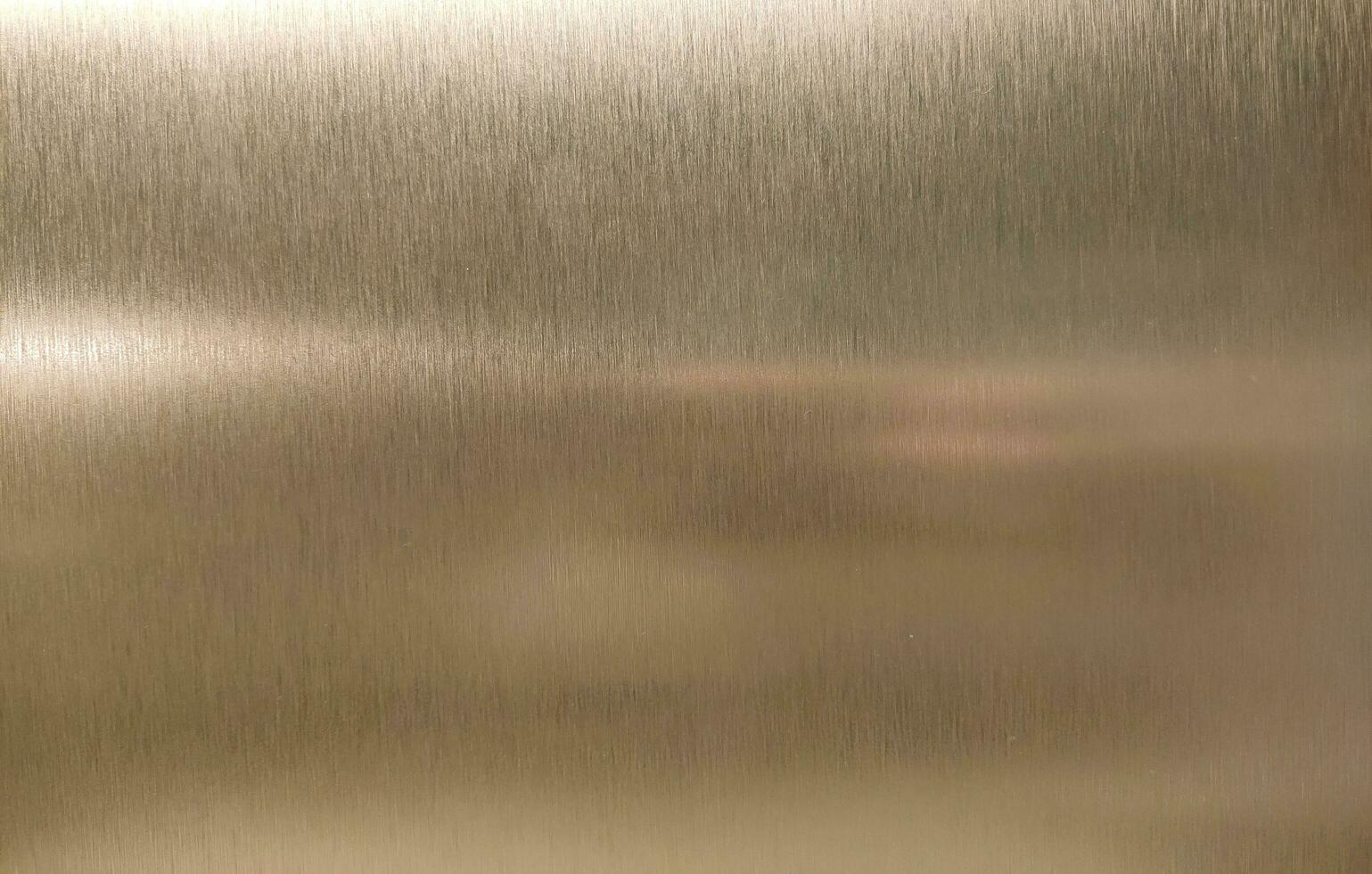 Abstract background with golden metal texture. photo
