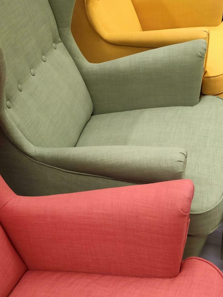 Chairs in different colors close-up. photo