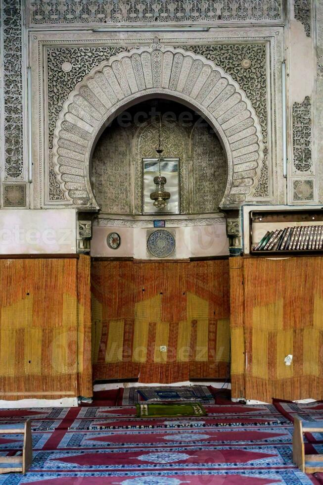 the interior of an old mosque in morocco photo