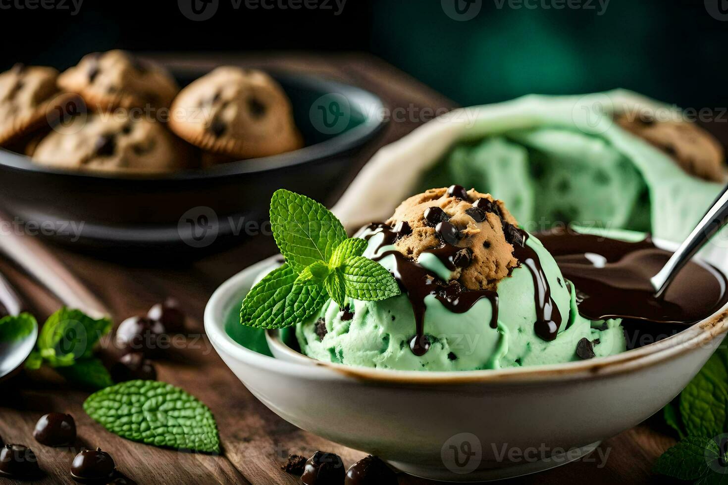 chocolate chip cookie ice cream with mint leaves and cookies. AI-Generated photo