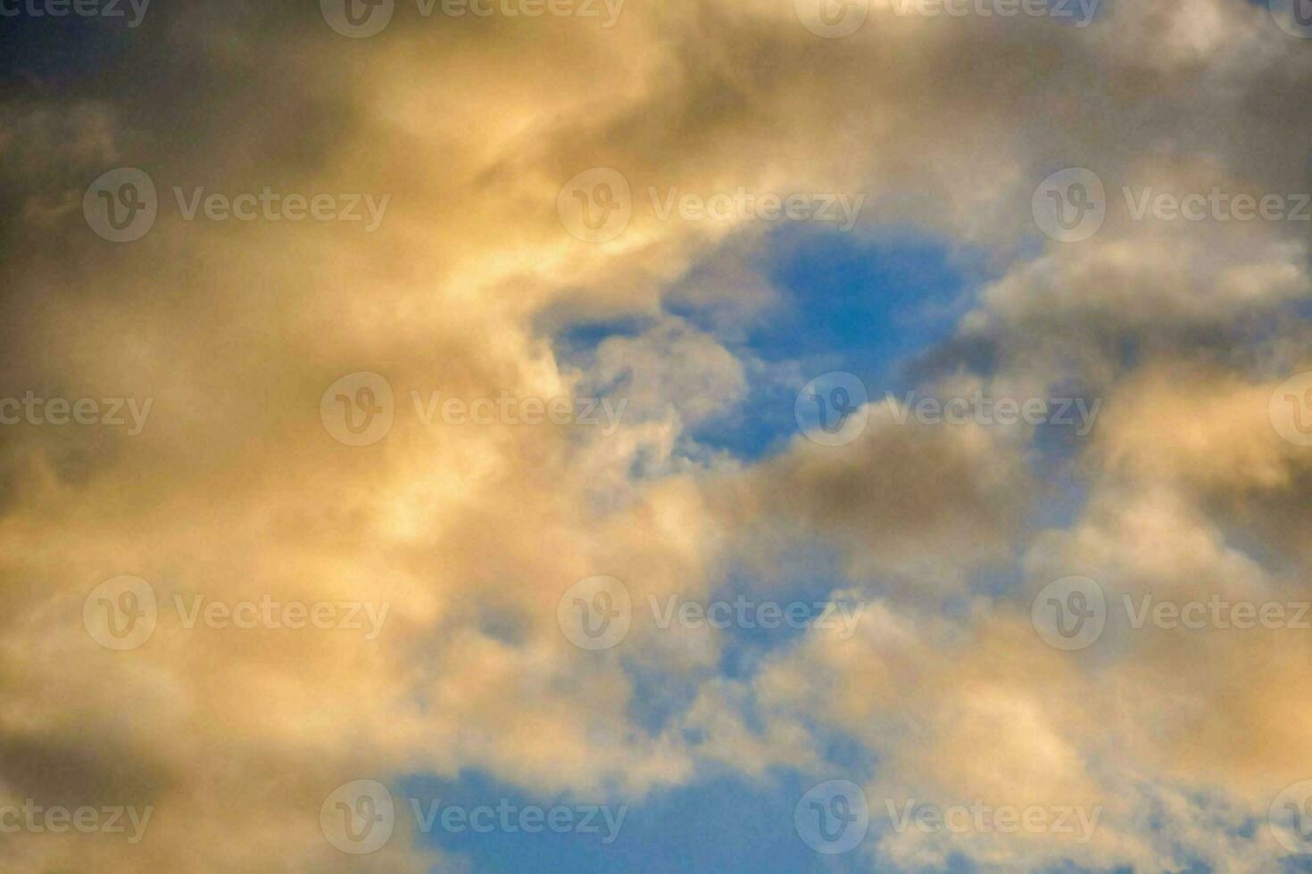 a blue sky with clouds photo