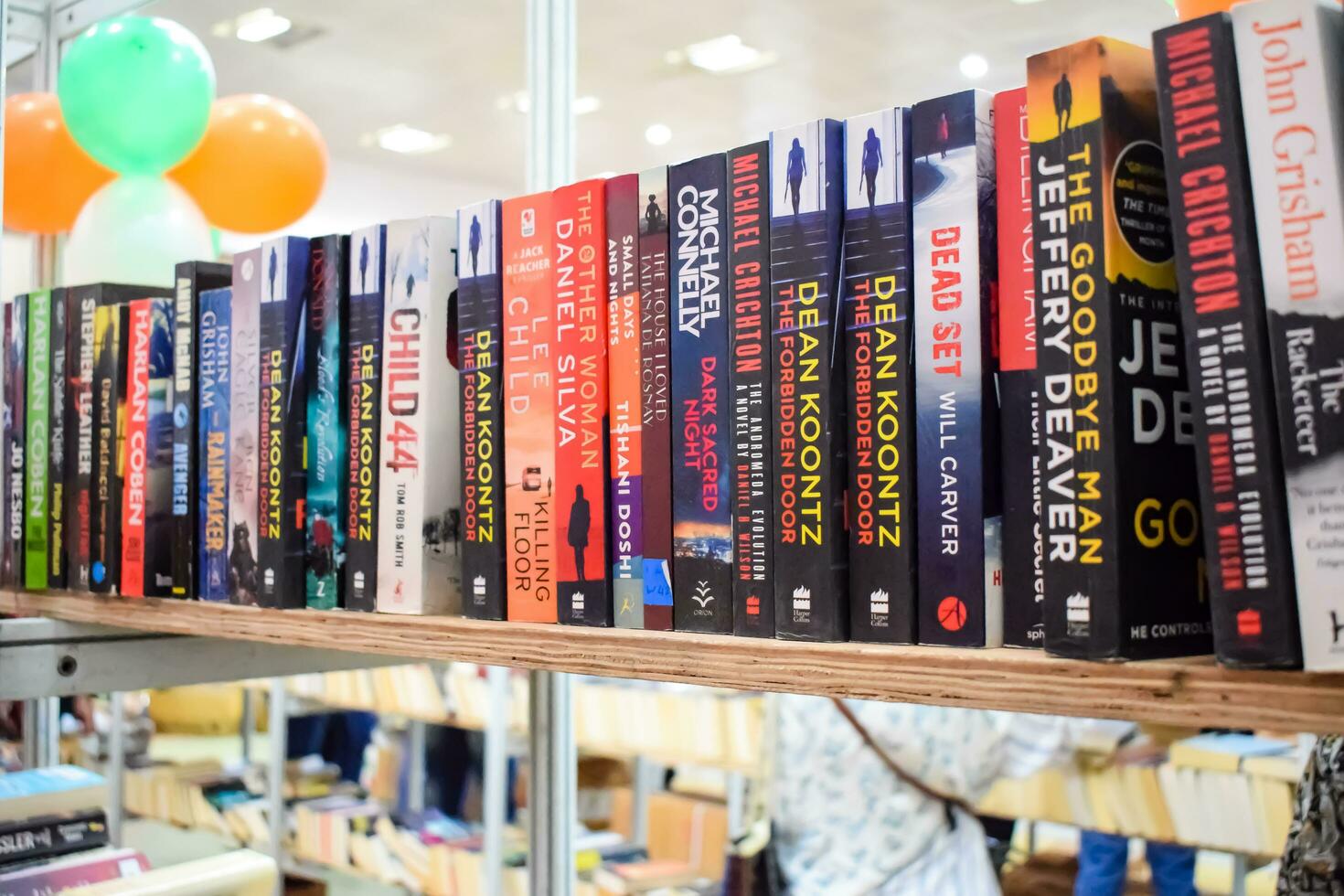 New Delhi, India, September 09 2023 - Variety of Books on shelf inside a book-stall at Delhi International Book Fair, Selection of books on display in Annual Book Fair. photo