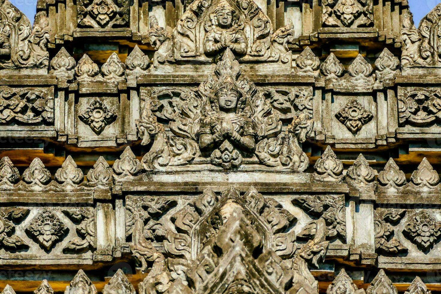 the intricate carvings on the side of a temple photo