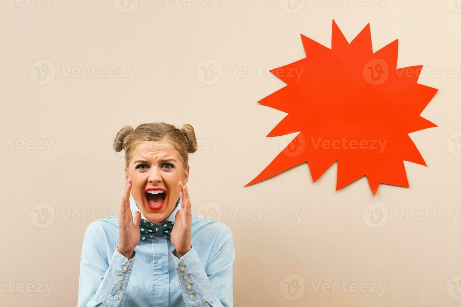 Angry geek girl screaming photo