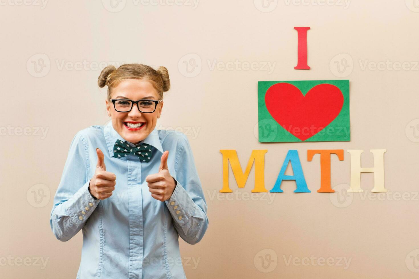 Nerdy girl showing thumbs up for math photo