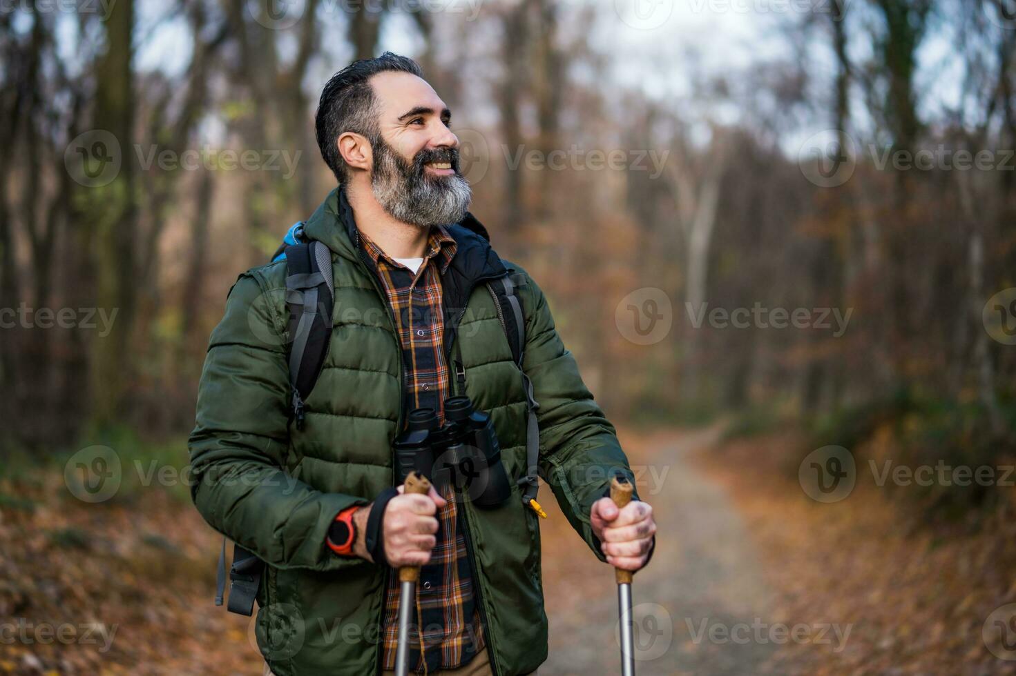 Image of man enjoys hiking in nature photo