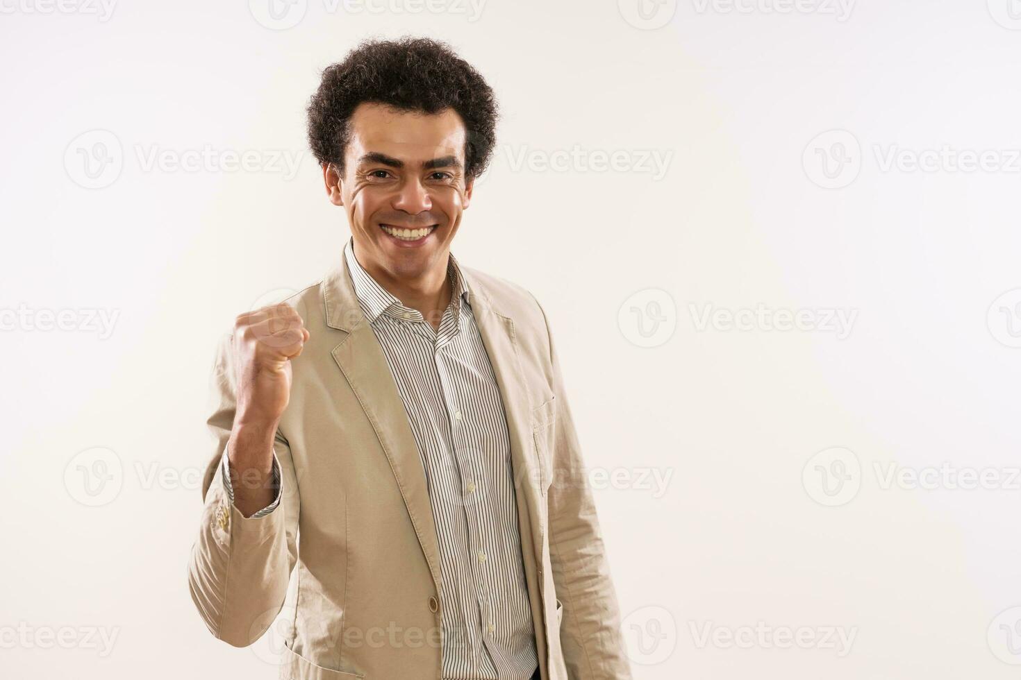 Portrait of happy and  successful businessman photo