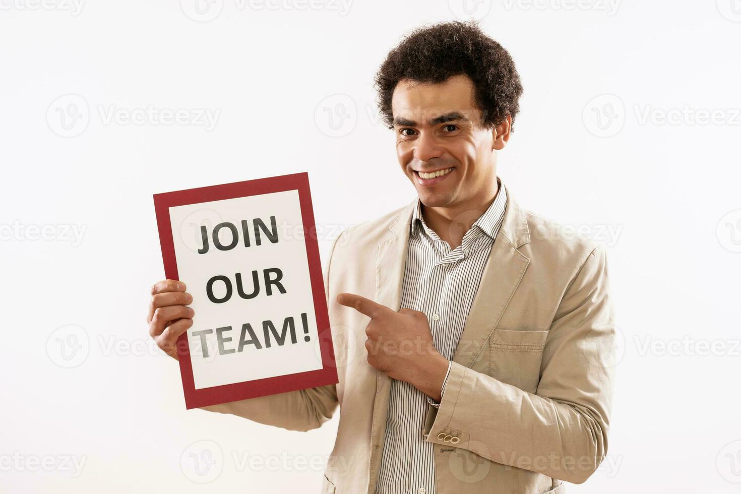 Image of businessman holding paper with text join our team photo