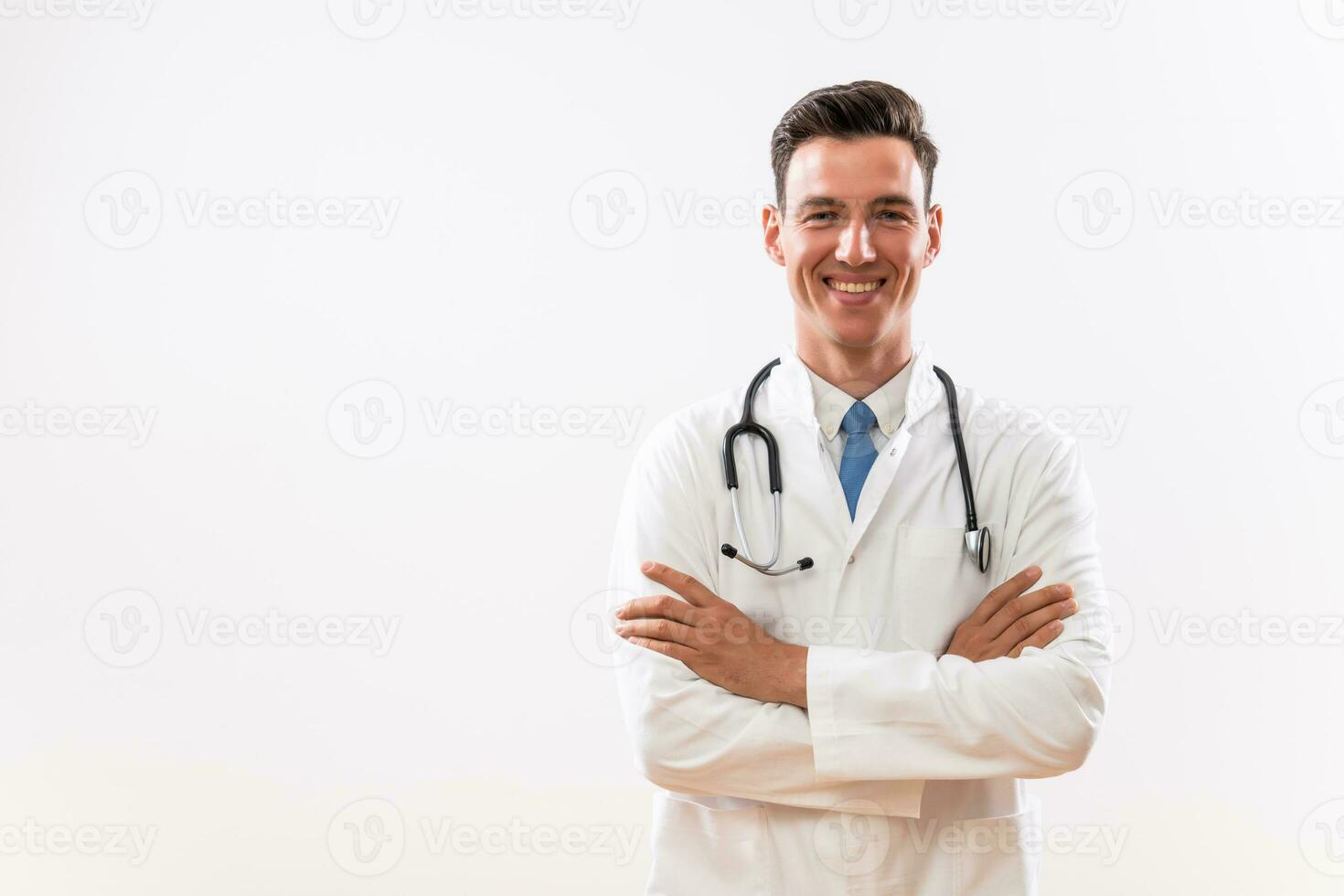 Portrait of young successful doctor smiling photo