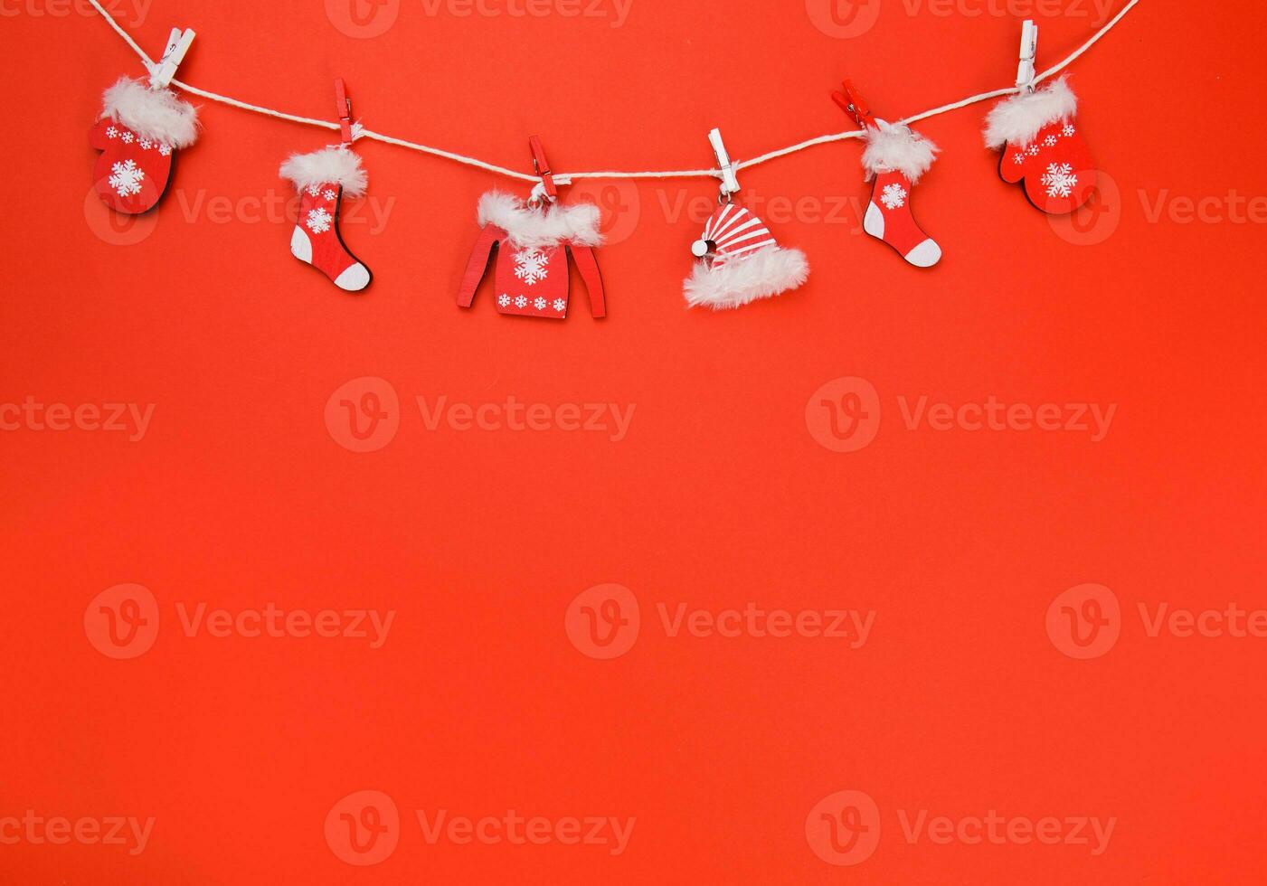 winter garland Christmas decoration on red background. photo