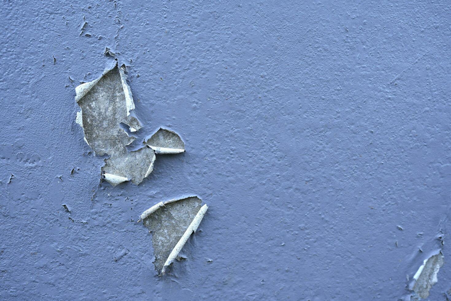 Concrete wall texture with Crack white color paint,Cement floor with Broken rough concrete surface,Light Grey background with plaster on building wall,Exterior wall Backdrop background with copy space photo