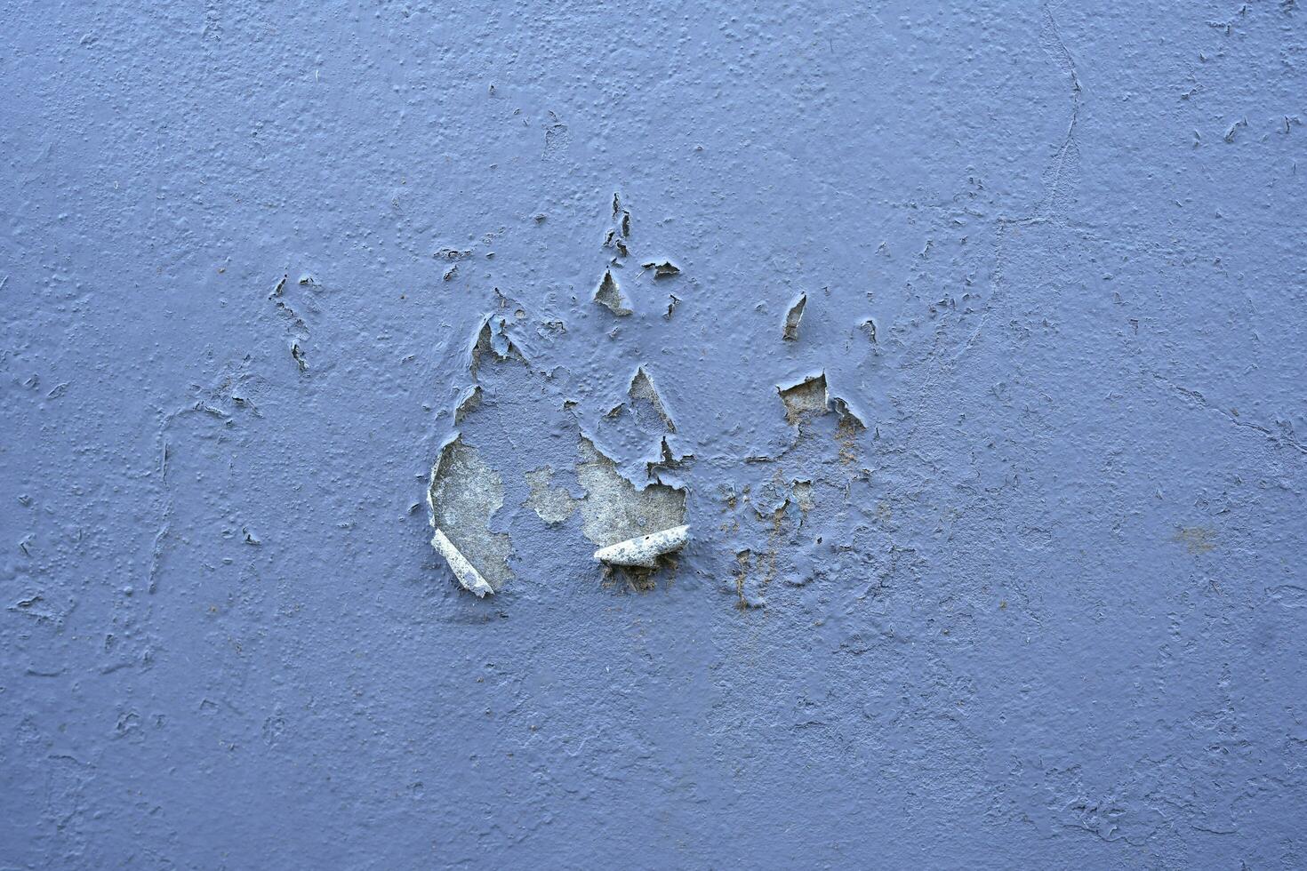 Concrete wall texture with Crack white color paint,Cement floor with Broken rough concrete surface,Light Grey background with plaster on building wall,Exterior wall Backdrop background with copy space photo