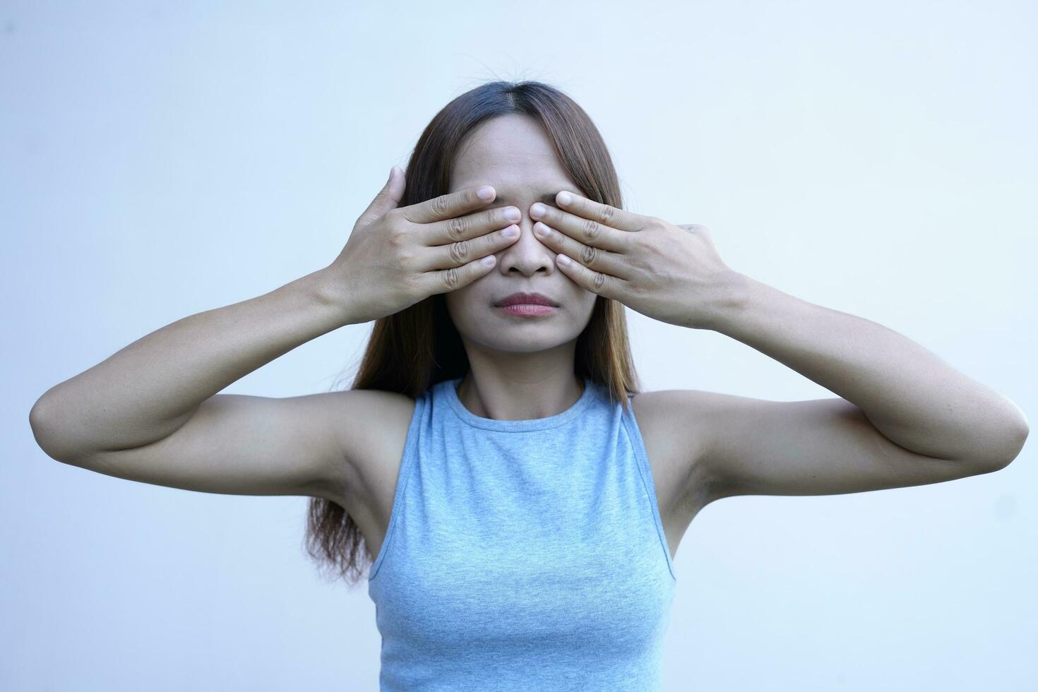 Asian woman has eye pain photo