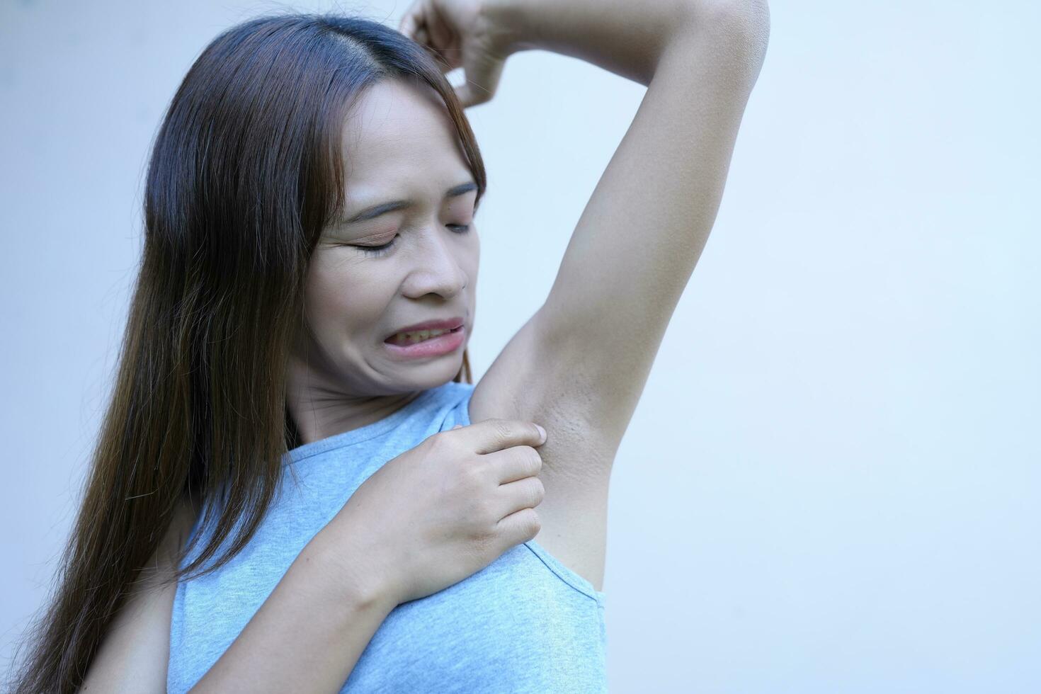 Asian women have damp armpits. photo