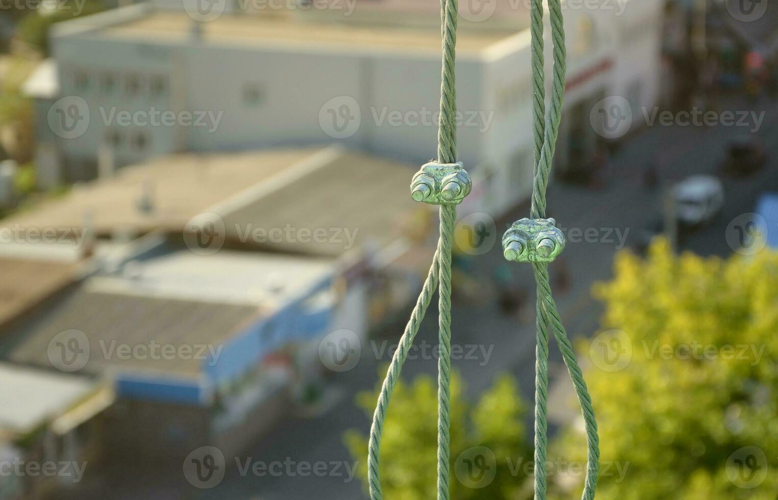 Rope lockers in of suspended wire rope platform for facade works on high multistorey buildings. Rope lockers blocks kink for safety platform usage photo