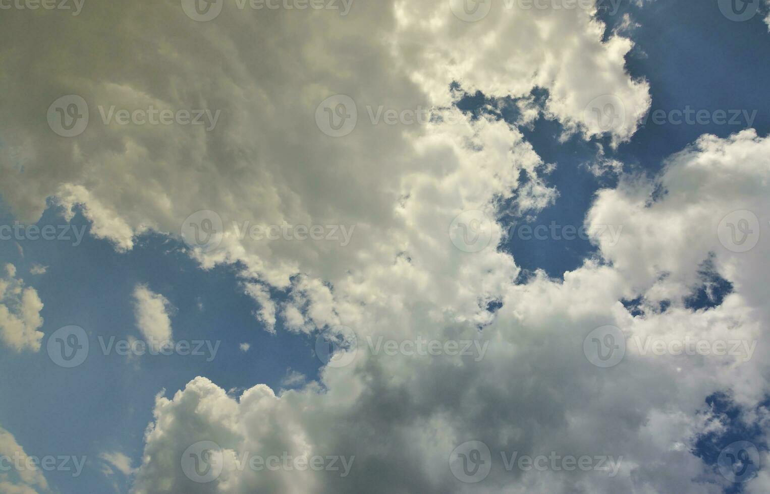 Beautiful blue sky background template with some space for input text message below isolated on blue photo