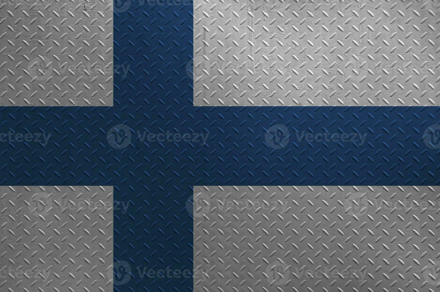 Finland flag depicted in paint colors on old brushed metal plate or wall closeup. Textured banner on rough background photo