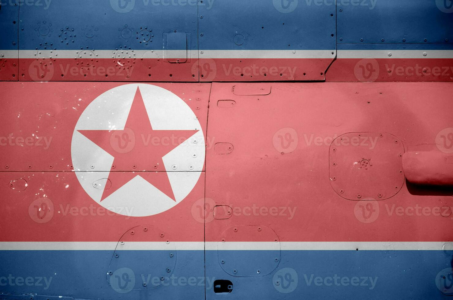 North Korea flag depicted on side part of military armored helicopter closeup. Army forces aircraft conceptual background photo