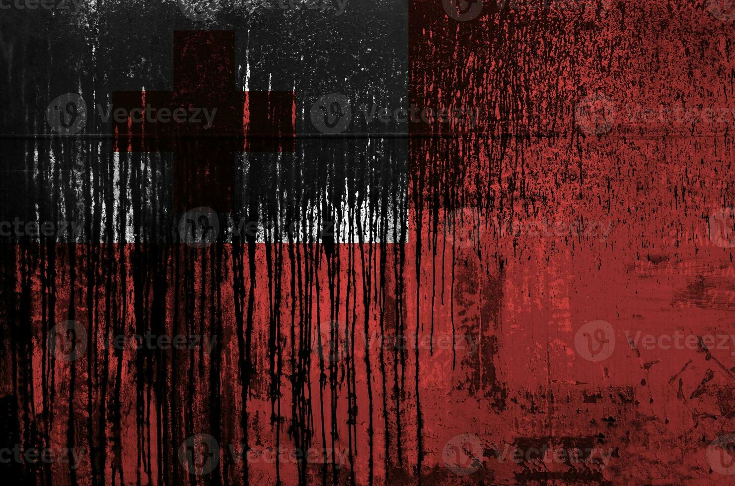 Tonga flag depicted in paint colors on old and dirty oil barrel wall closeup. Textured banner on rough background photo