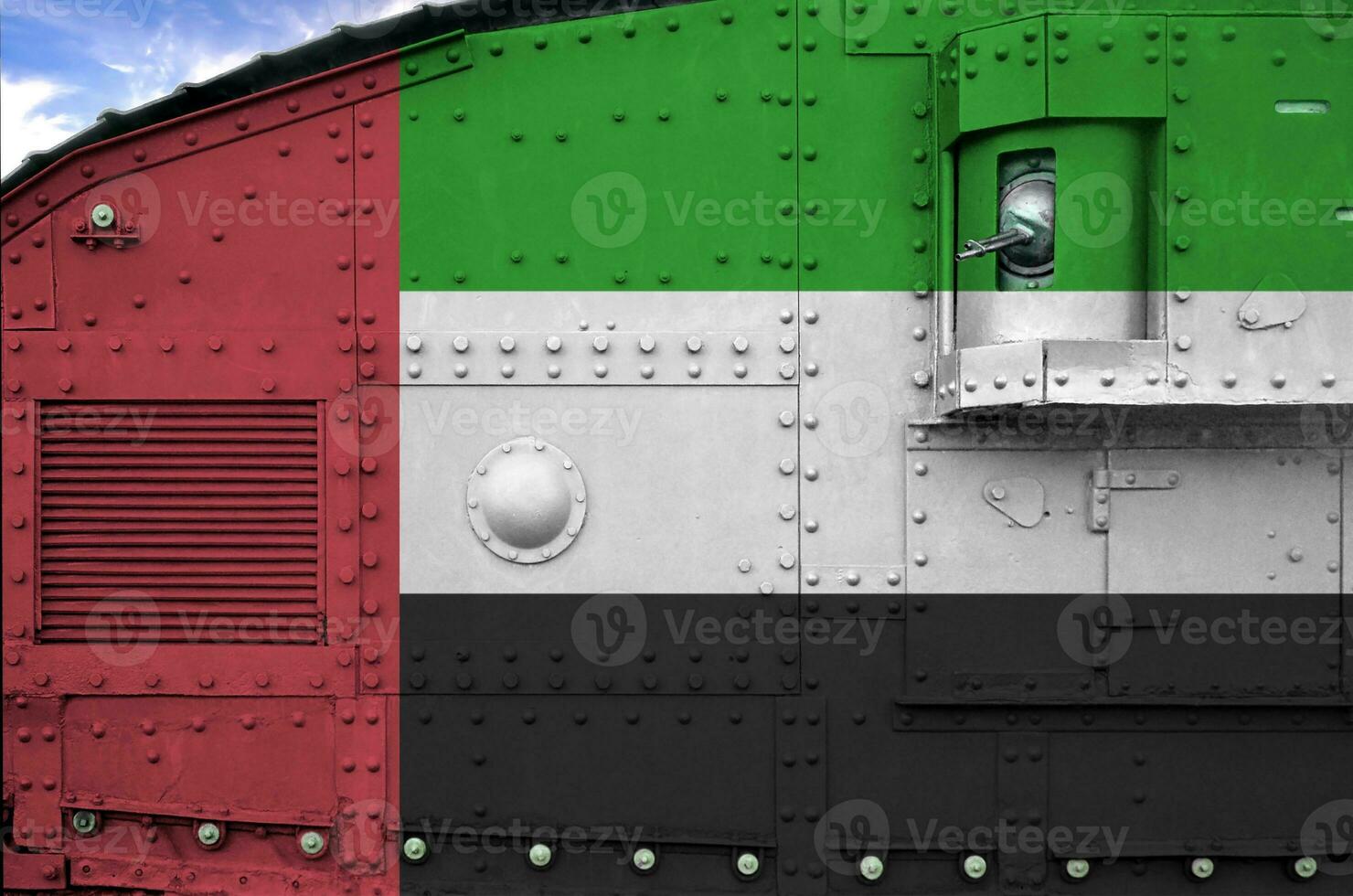 United Arab Emirates flag depicted on side part of military armored tank closeup. Army forces conceptual background photo