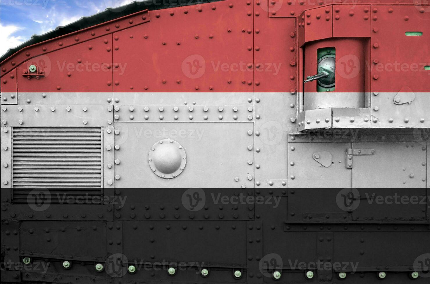 Yemen flag depicted on side part of military armored tank closeup. Army forces conceptual background photo
