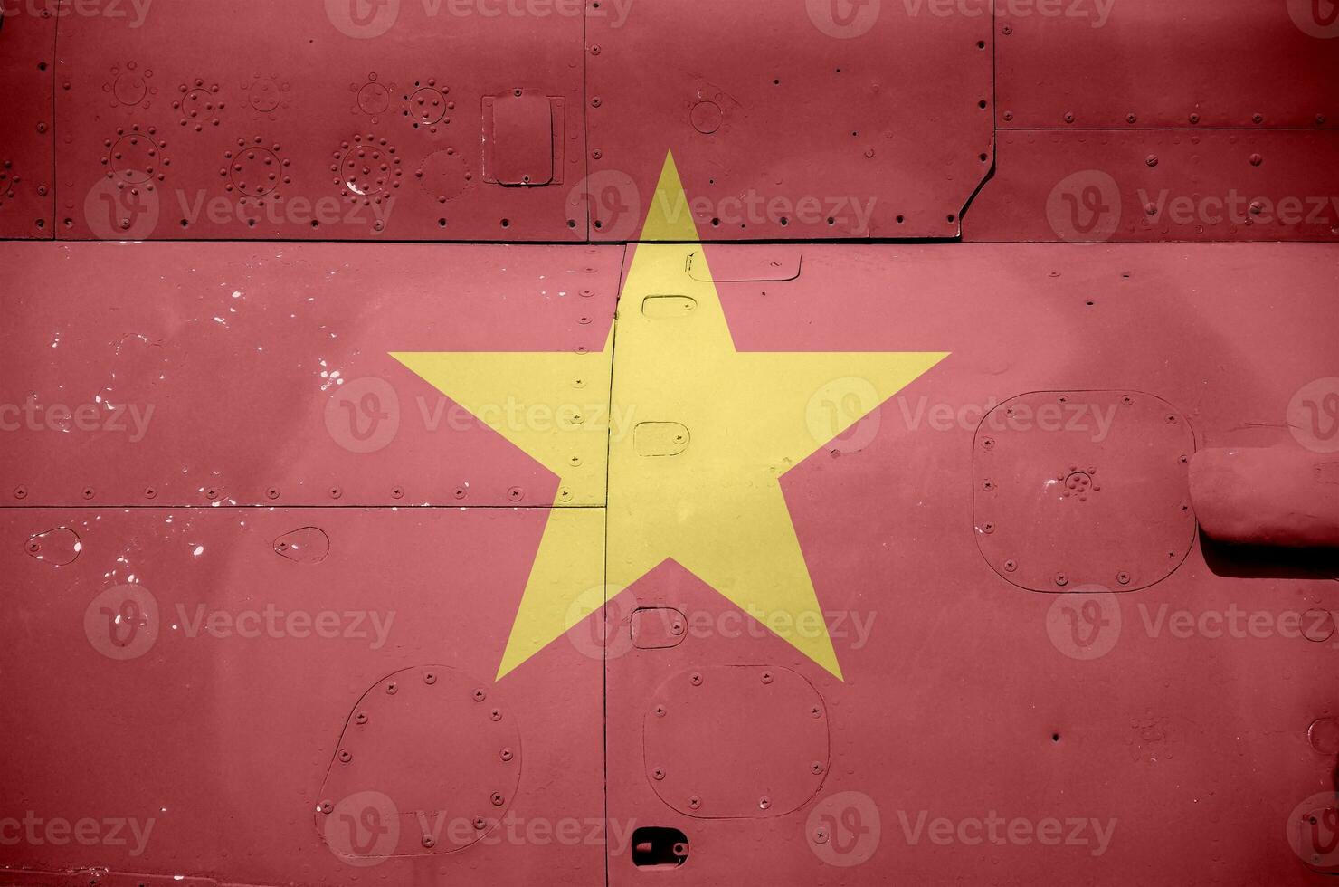 Vietnam flag depicted on side part of military armored helicopter closeup. Army forces aircraft conceptual background photo