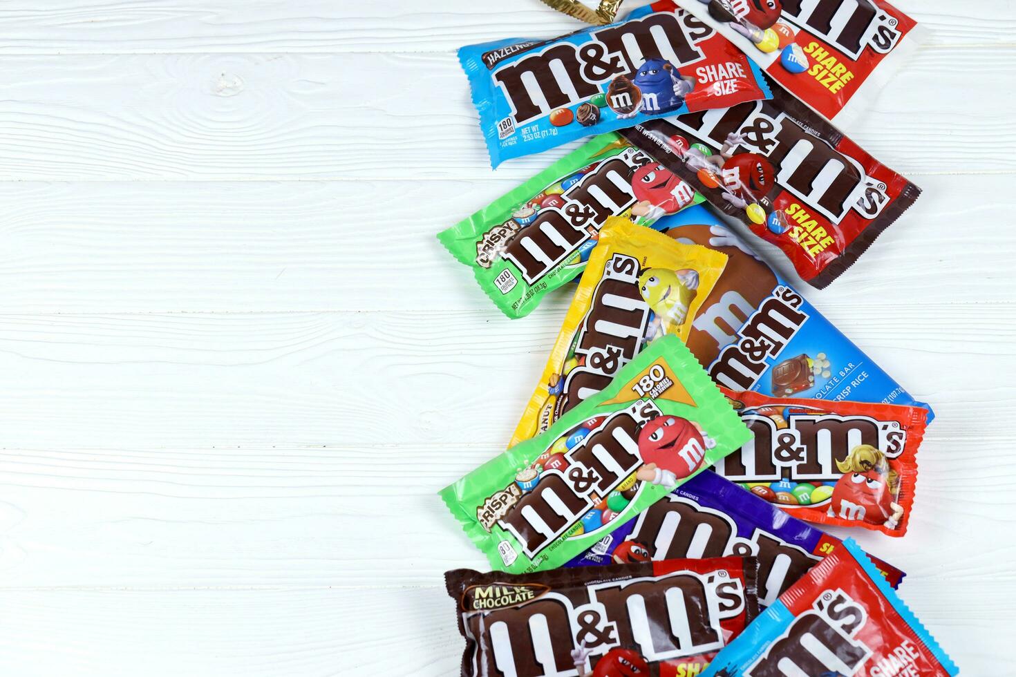 KHARKOV, UKRAINE - MARCH 15, 2021 M M's chocolate candies packs with various tastes and design. M M's produced by Mars Incorporated photo